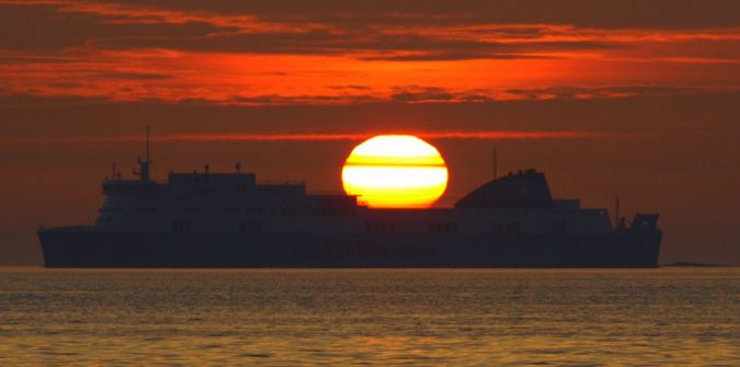 sunrise over a ship